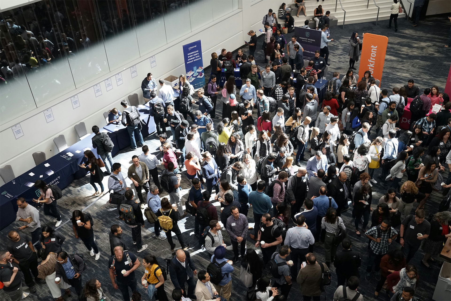 Overhead view of lots of people in a convention center